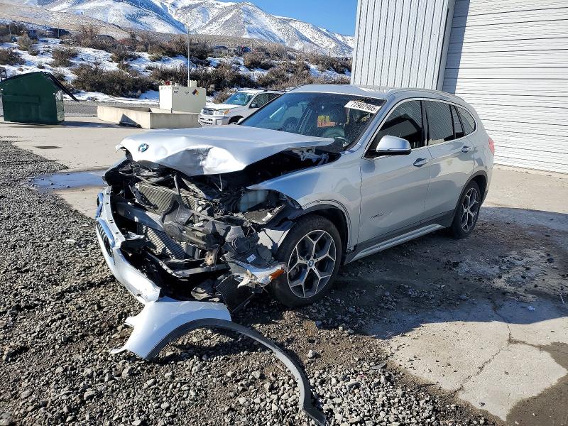 2018 BMW X1 XDRIVE2 — VIN WBXHT3C33J5K27658