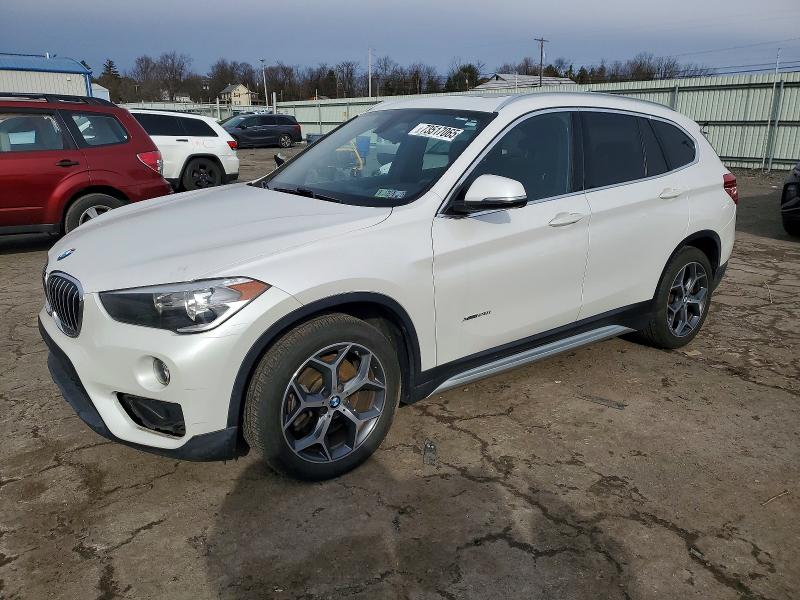 2018 BMW X1 XDRIVE2 — VIN WBXHT3C32J5K23505