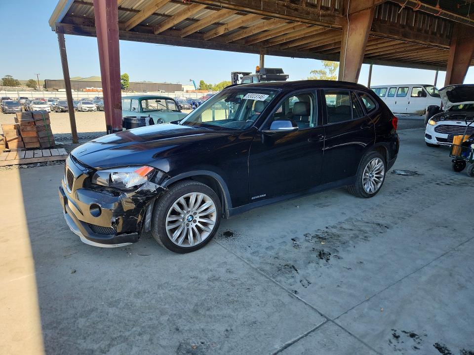 2015 BMW X1 — VIN WBAVM1C58FVZ93909
