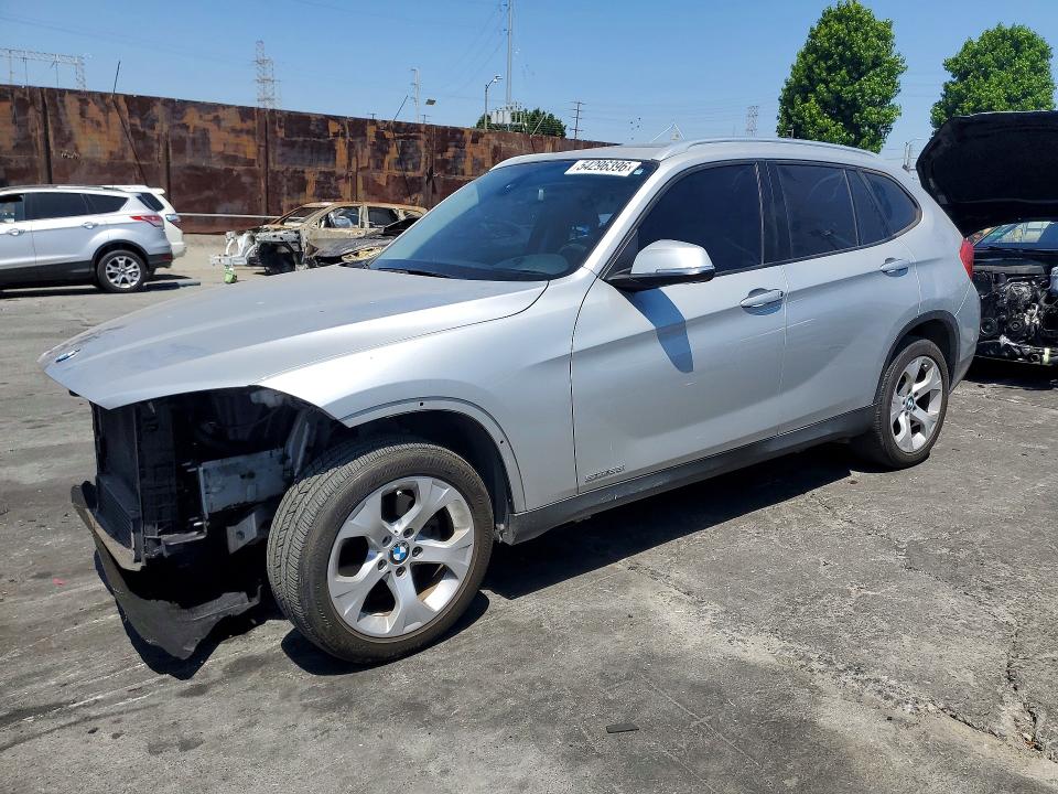 2015 BMW X1 — VIN WBAVM1C58FVW57077