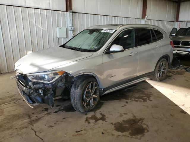 2017 BMW X1 — VIN WBXHT3C38H5F79633