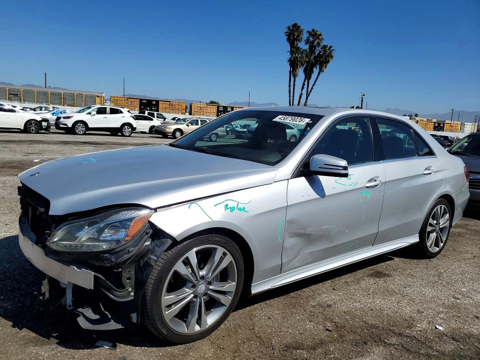 2015 MERCEDES-BENZ E — VIN WDDHF5KB9FB112876