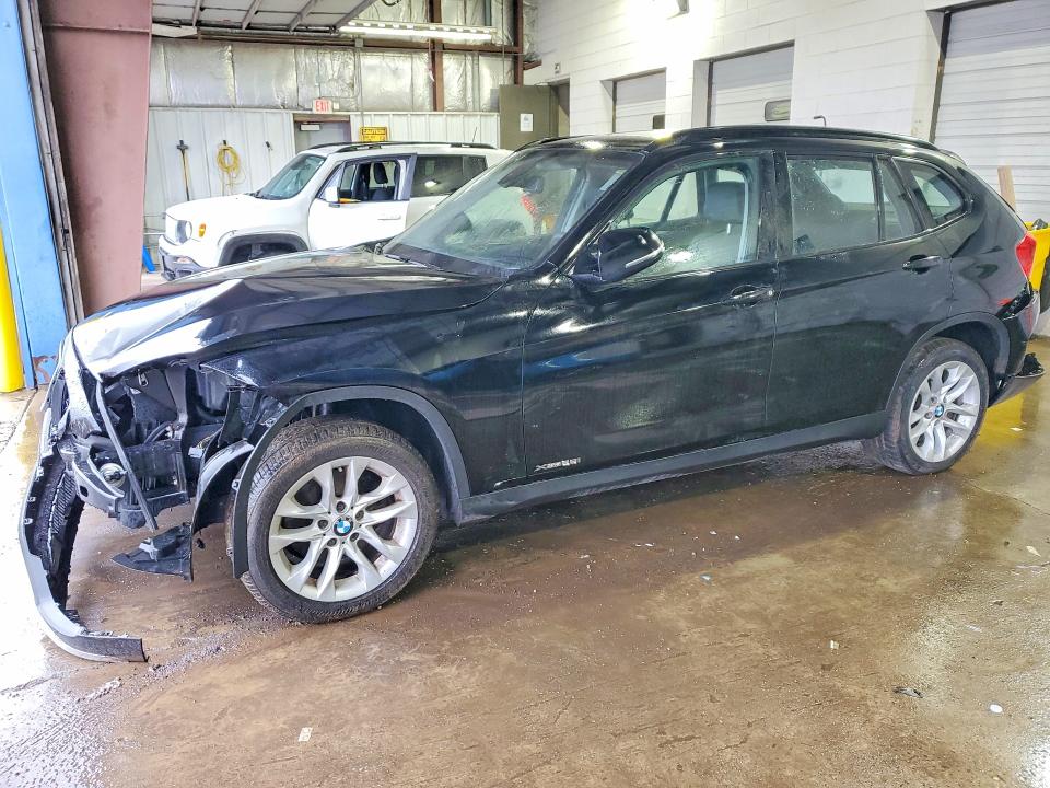 2015 BMW X1 — VIN WBAVL1C58FVY36058
