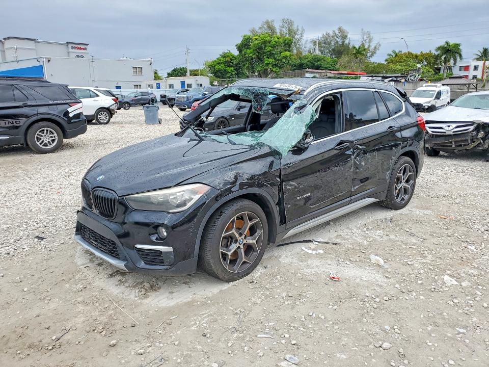 2017 BMW X1 — VIN WBXHT3C34H5F80598
