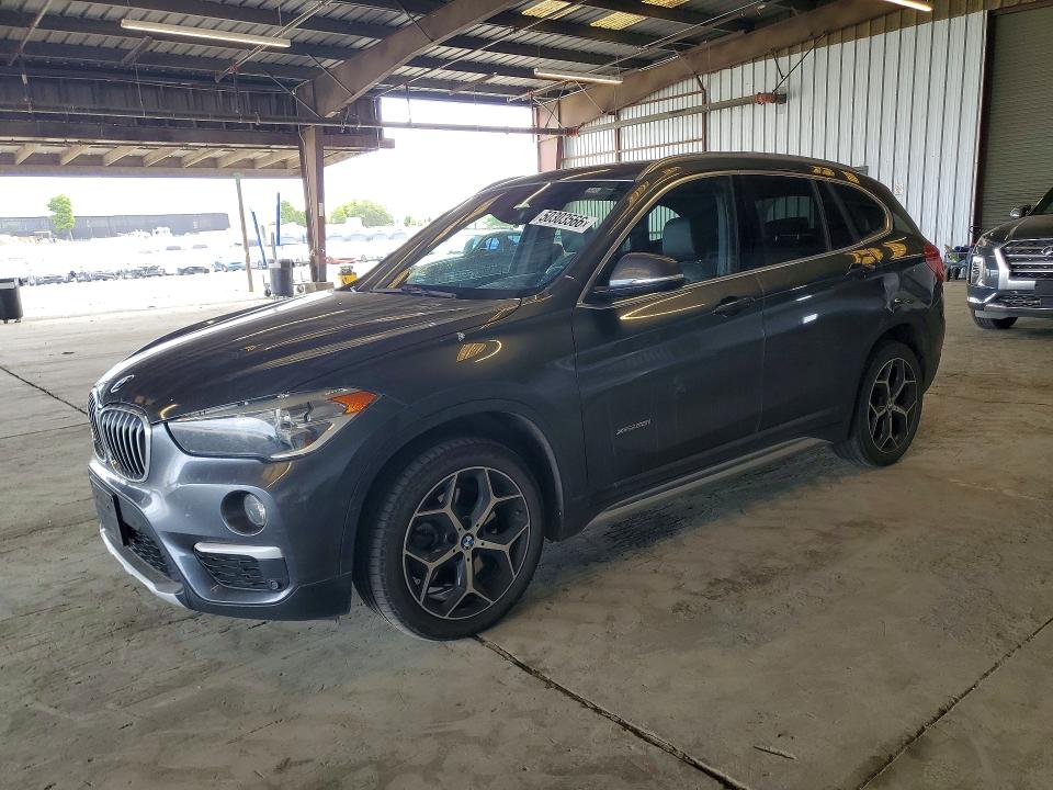 2018 BMW X1 — VIN WBXHT3C30J5K31053