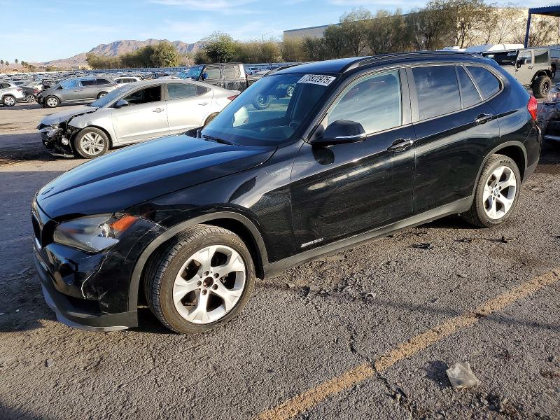 2015 BMW X1 — VIN WBAVM1C51FVW58586