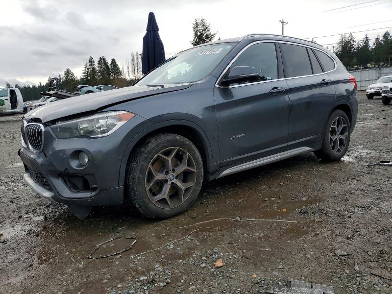 2016 BMW X1 — VIN WBXHT3C38G5F64614