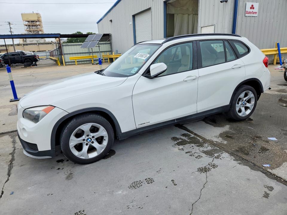 2015 BMW X1 — VIN WBAVM1C53FV319103