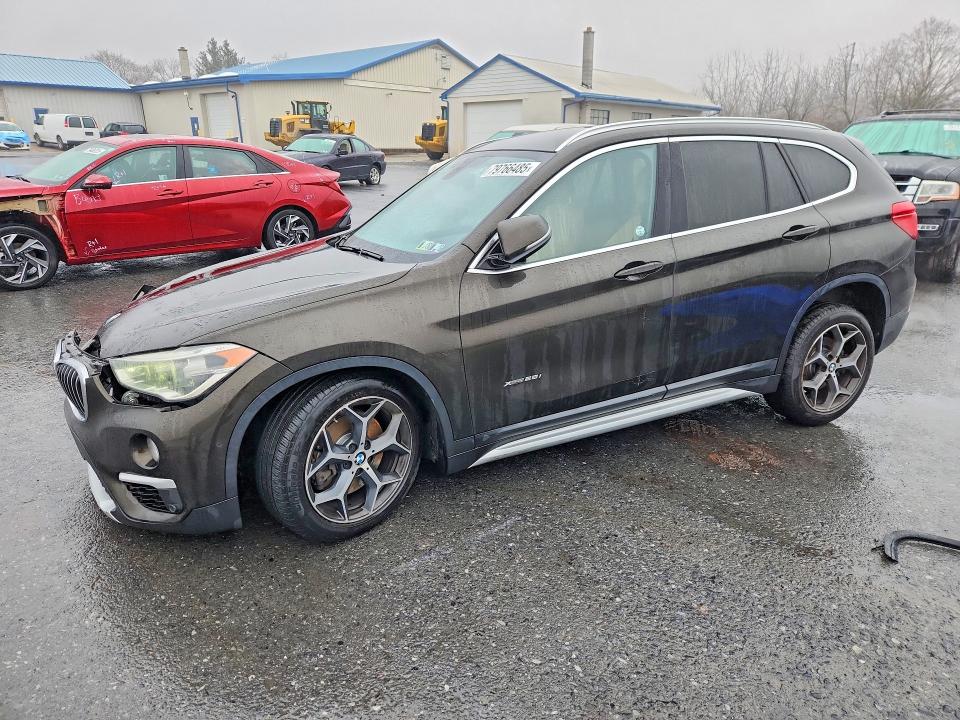 2017 BMW X1 — VIN WBXHT3C30H5F86009
