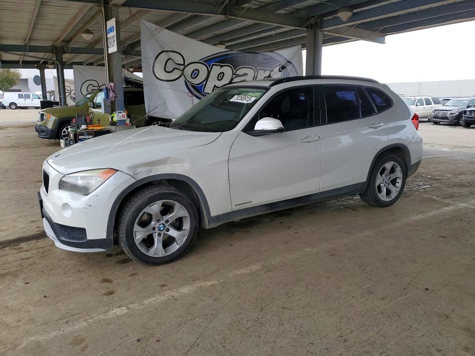 2015 BMW X1 — VIN WBAVM1C52FVW57012