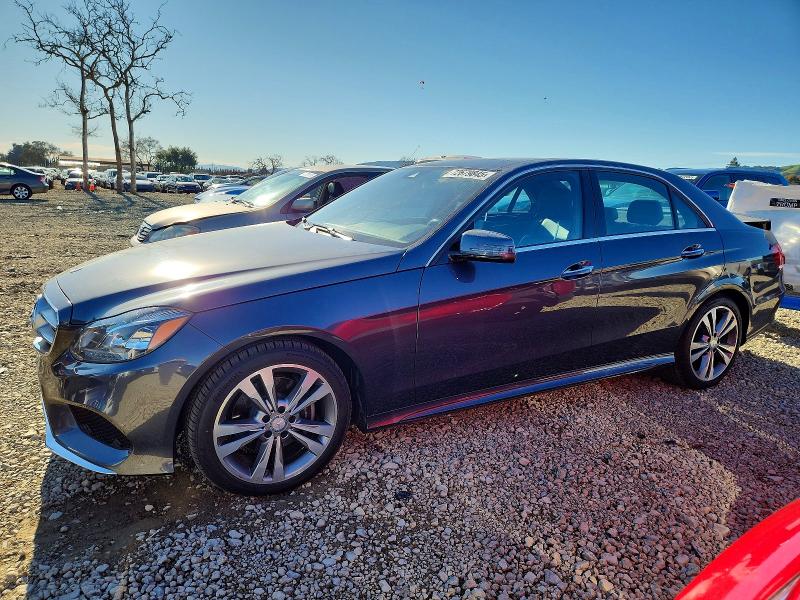 2015 MERCEDES-BENZ E — VIN WDDHF5KB9FB139088