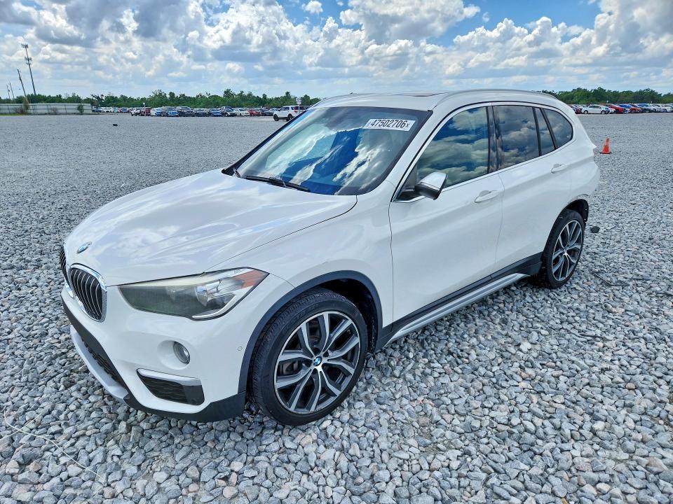2018 BMW X1 — VIN WBXHU7C3XJ3H43664