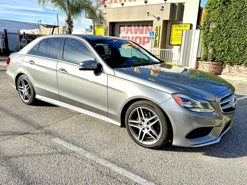 2015 MERCEDES-BENZ E — VIN WDDHF5KB2FB105848