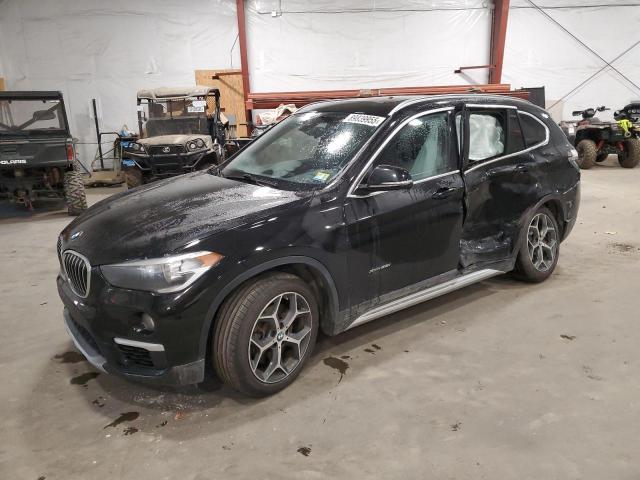 2018 BMW X1 XDRIVE2 — VIN WBXHT3C39J5K24909