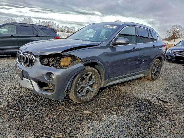 2018 BMW X1 XDRIVE2 — VIN WBXHT3C32J5L31803