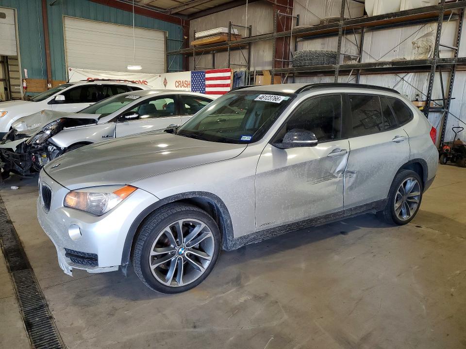 2015 BMW X1 — VIN WBAVM1C57FVW57023