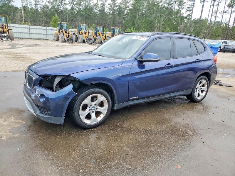 2014 BMW X1 SDRIVE2 — VIN WBAVM1C59EVW49049