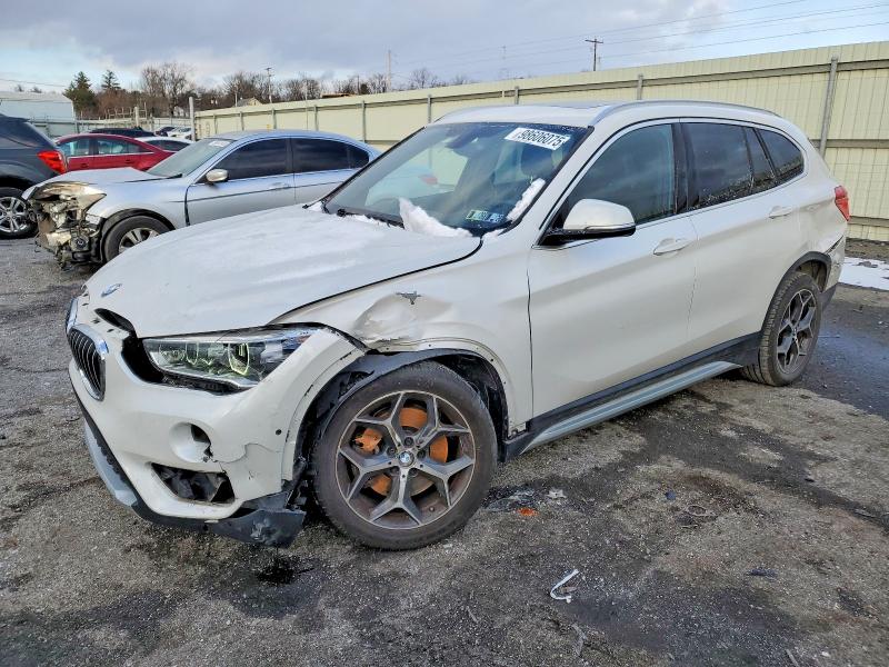 2018 BMW X1 XDRIVE2 — VIN WBXHT3C32J3F03925