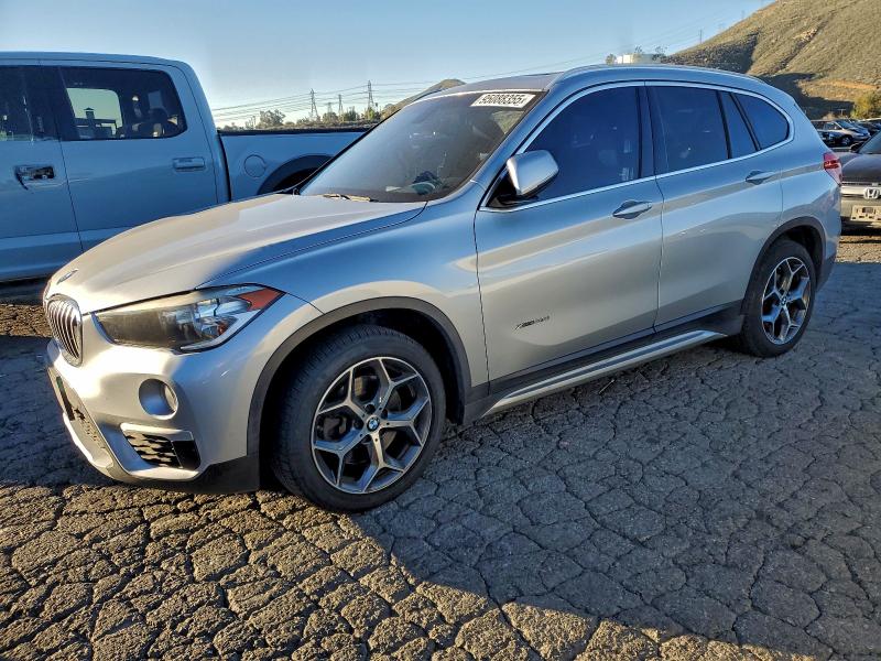 2018 BMW X1 XDRIVE2 — VIN WBXHT3C33J5L26769