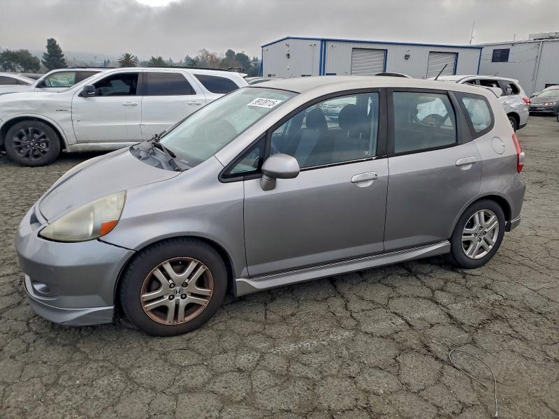 2007 HONDA FIT S — VIN JHMGD38657S028516