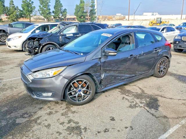 2016 FORD FOCUS SE — VIN 1FADP3K21GL213048