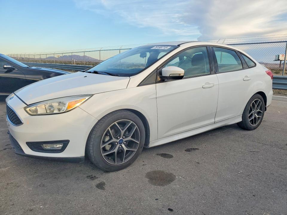 2016 FORD FOCUS SE — VIN 1FADP3F24GL406983