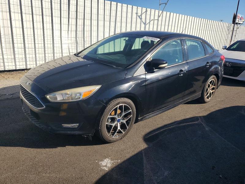 2016 FORD FOCUS SE — VIN 1FADP3F21GL384165