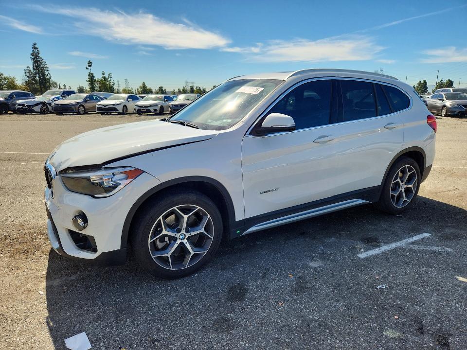 2018 BMW X1 — VIN WBXHU7C31J5H39104