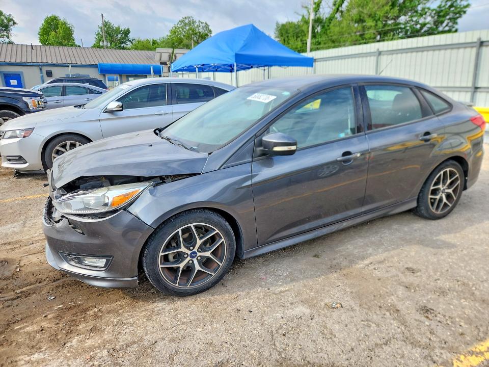 2016 FORD FOCUS — VIN 1FADP3F23GL383406