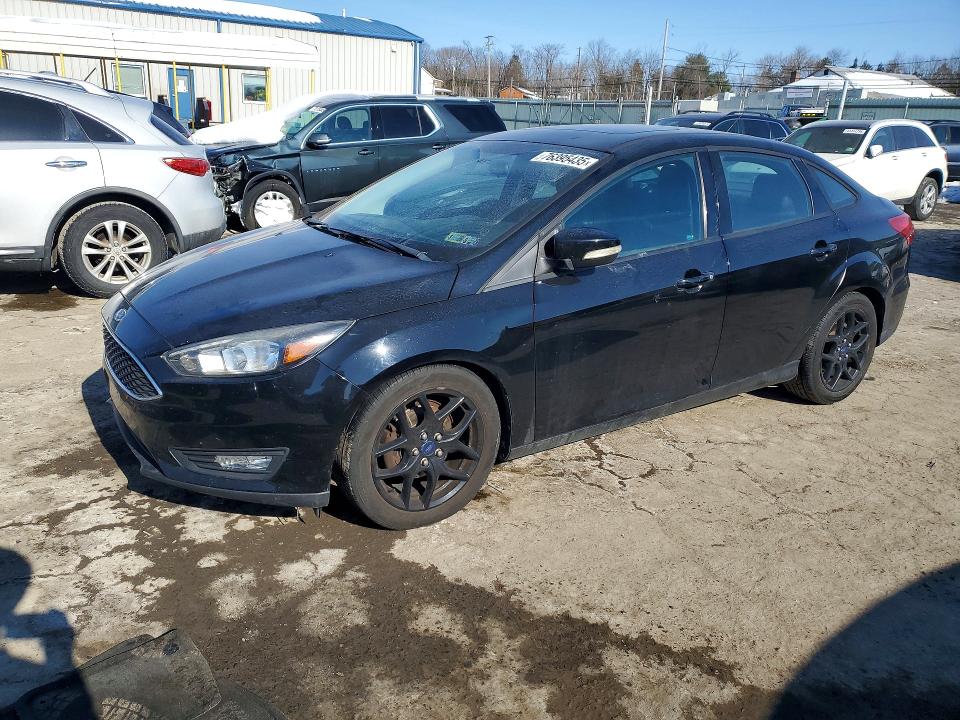 2016 FORD FOCUS SE — VIN 1FADP3F24GL206086