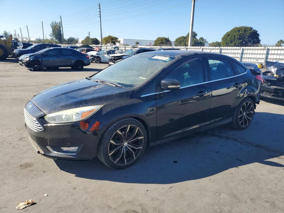 2016 FORD FOCUS TITA — VIN 1FADP3J23GL308907