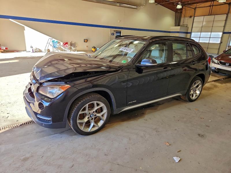 2013 BMW X1 XDRIVE3 — VIN WBAVM5C57DVV89357