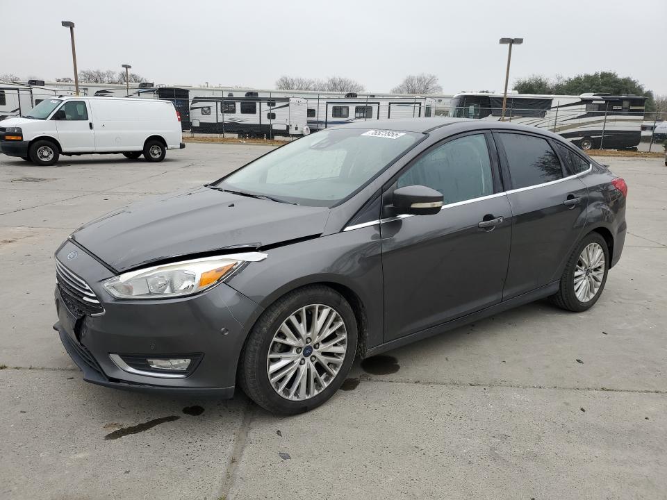 2016 FORD FOCUS TITA — VIN 1FADP3J20GL298112