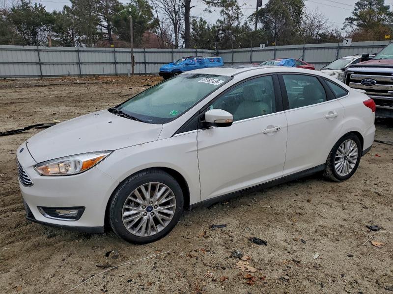 2018 FORD FOCUS TITA — VIN 1FADP3J24JL281000