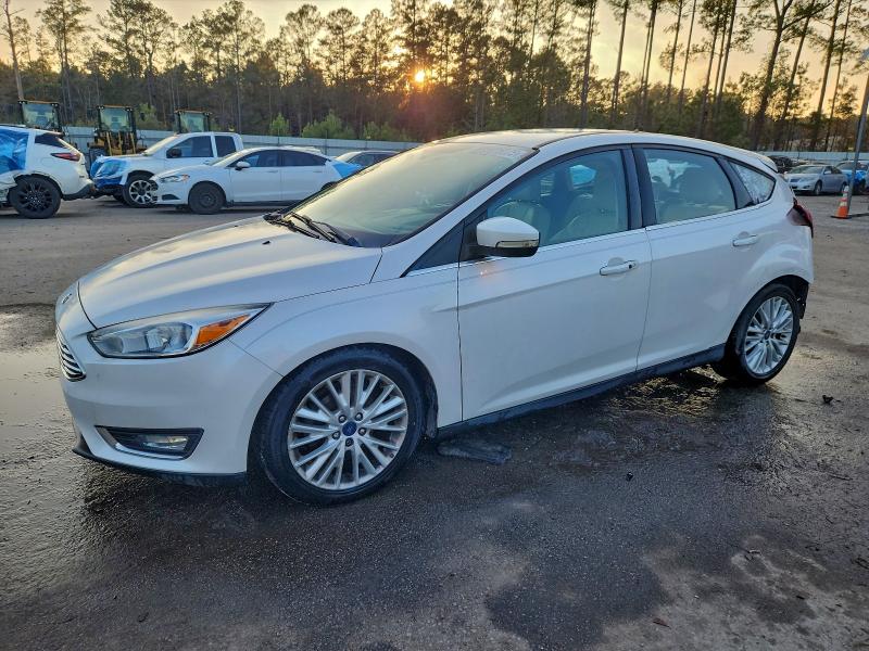 2016 FORD FOCUS TITA — VIN 1FADP3N23GL307086