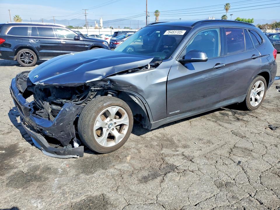 2015 BMW X1 SDRIVE2 — VIN WBAVM1C59FV316299