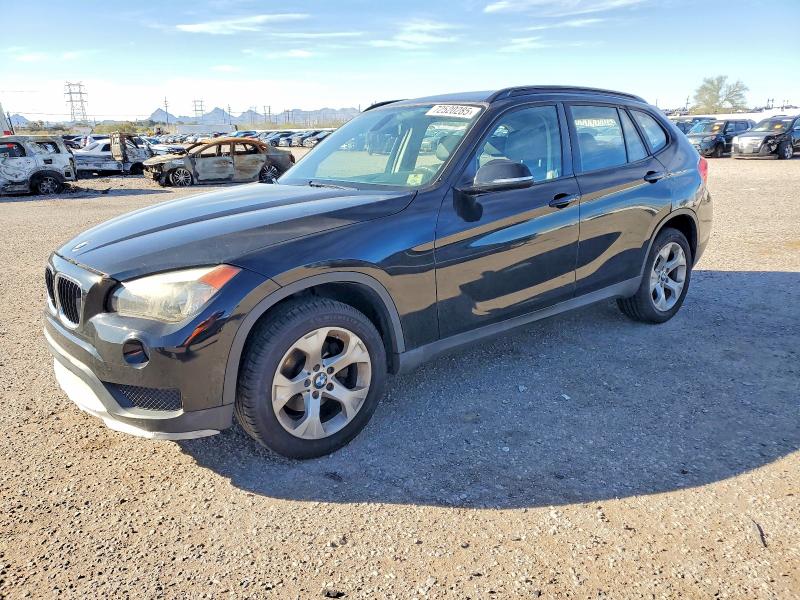 2015 BMW X1 SDRIVE2 — VIN WBAVM1C53FV317769