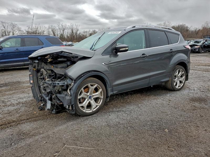 2017 FORD ESCAPE TIT — VIN 1FMCU9J90HUC70784