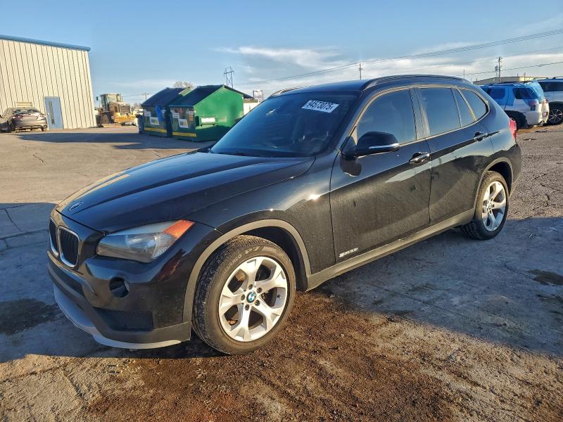 2015 BMW X1 SDRIVE2 — VIN WBAVM1C5XFV498885