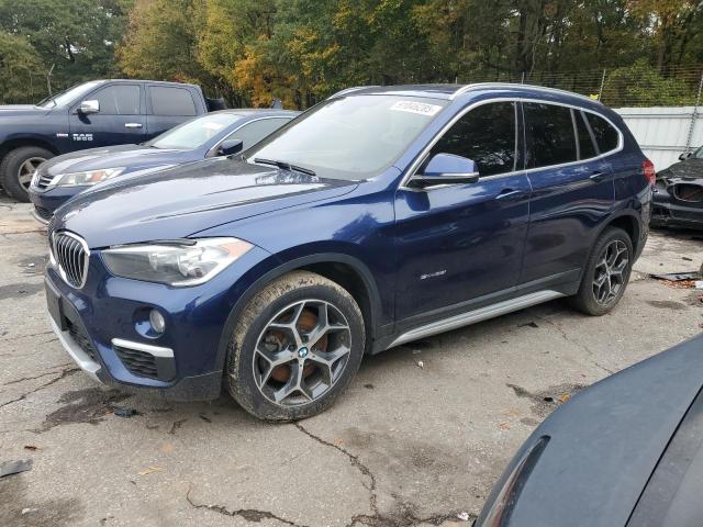 2018 BMW X1 SDRIVE2 — VIN WBXHU7C36J5H43889