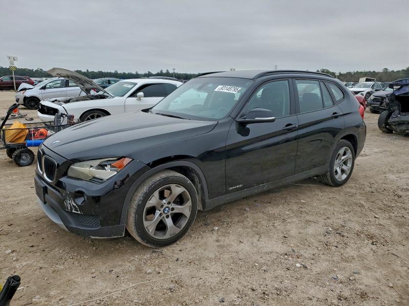2014 BMW X1 SDRIVE2 — VIN WBAVM1C55EVW53681