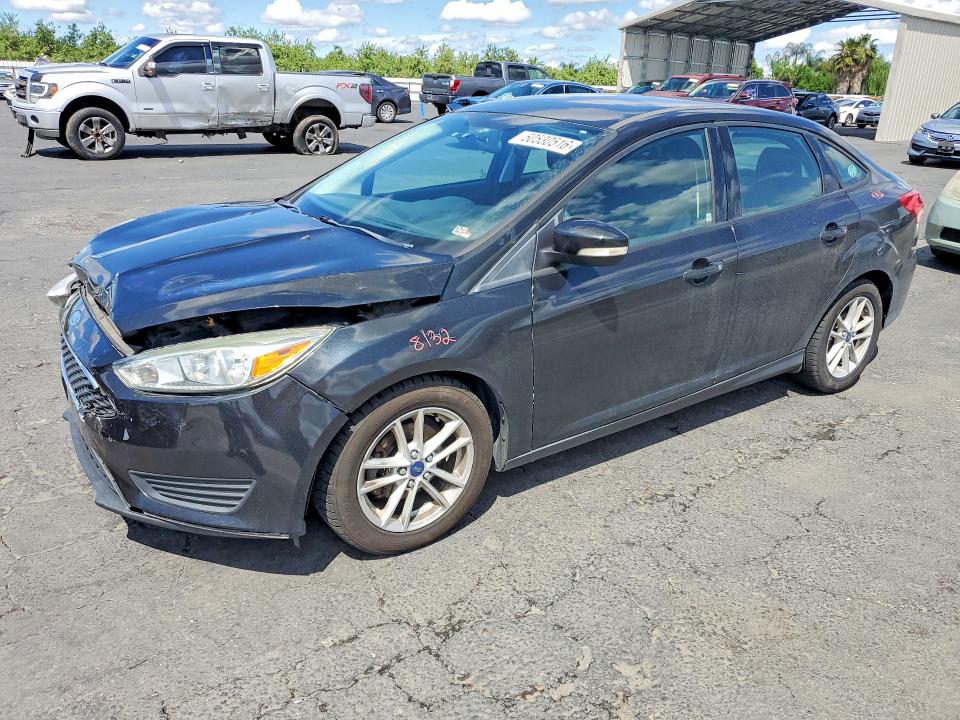 2015 FORD FOCUS — VIN 1FADP3F21FL217223