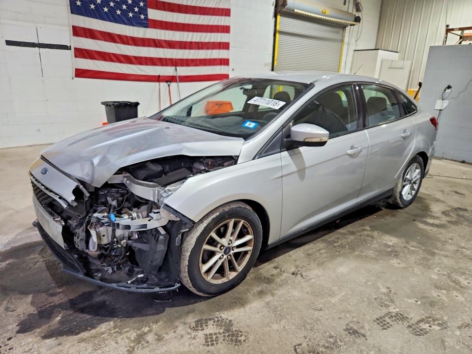 2016 FORD FOCUS — VIN 1FADP3F20GL256404
