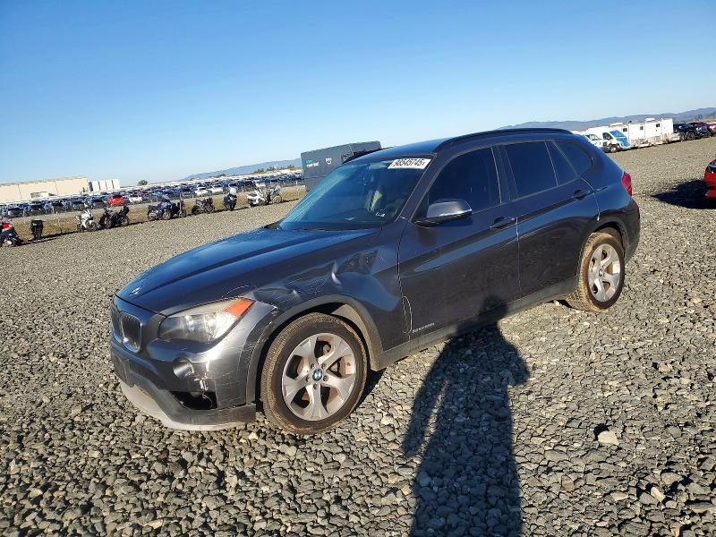 2015 BMW X1 SDRIVE2 — VIN WBAVM1C54FV318557