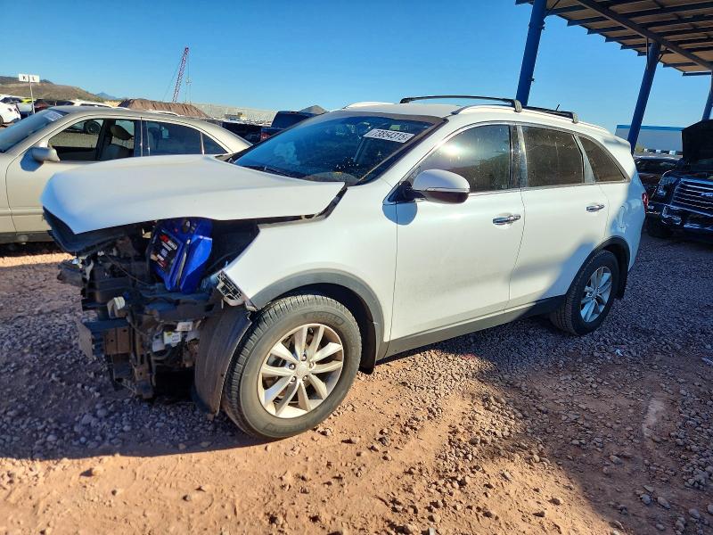 2016 KIA SORENTO LX — VIN 5XYPG4A59GG094590