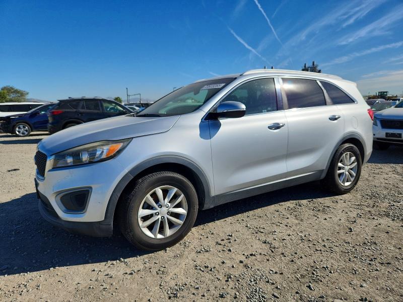 2016 KIA SORENTO LX — VIN 5XYPG4A34GG144231