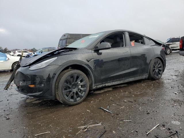 2023 TESLA MODEL Y — VIN 7SAYGAEE2PF864278