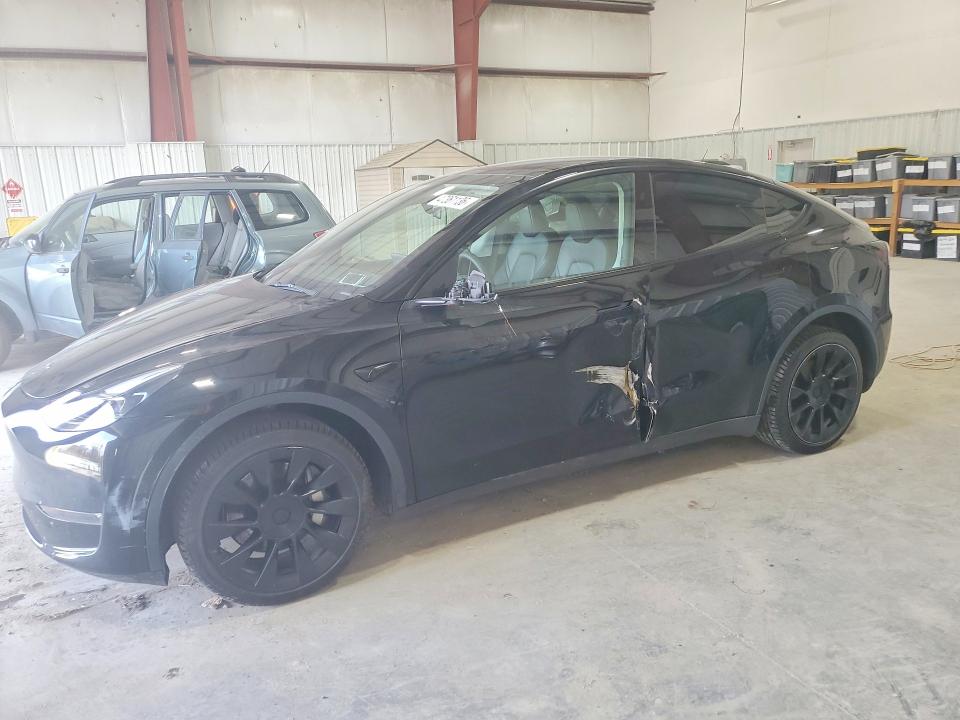 2023 TESLA MODEL Y — VIN 7SAYGDEE1PF791034