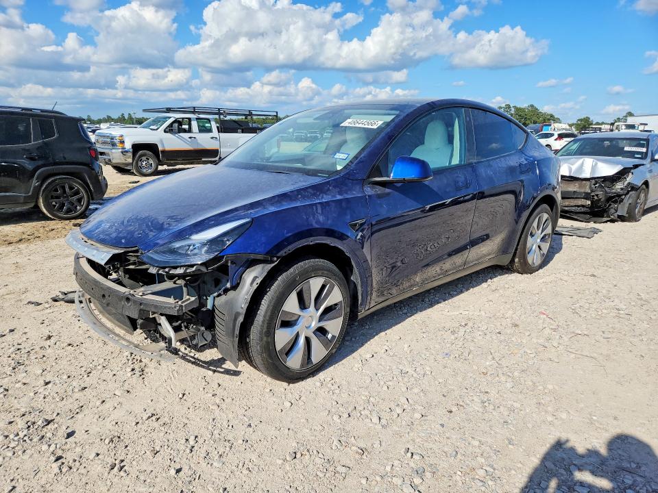 2023 TESLA MODEL Y — VIN 7SAYGDEE0PA099425