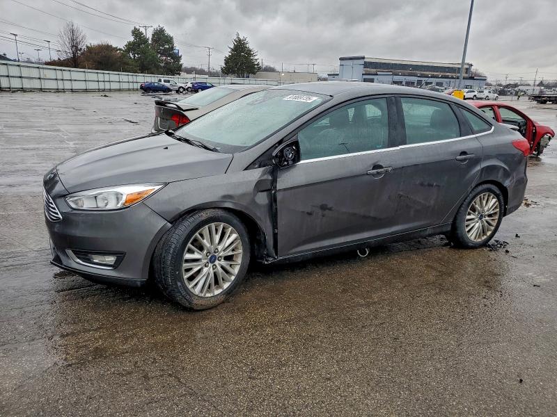 2016 FORD FOCUS TITA — VIN 1FADP3J27GL230051